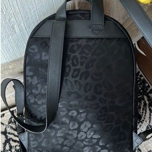 Michael Kors black leopard backpack